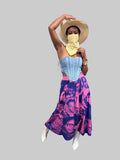 Full outfit photo of model wearing Black Herstory midi skirt with purple collage print and elastic waistband