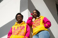 Akim Wlson and Ebony Payne English wearing Godder Than a Mutha Hoodies 