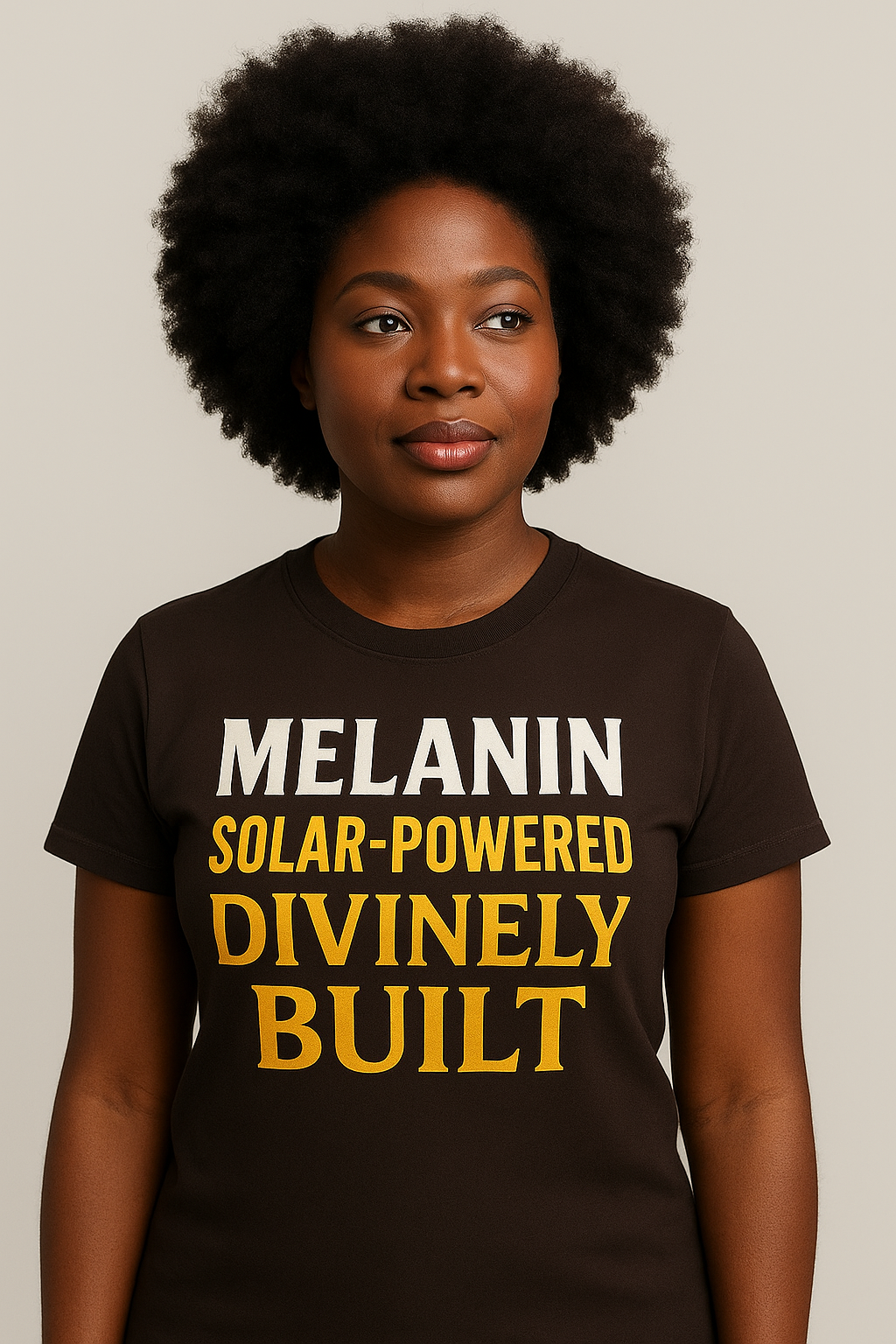 Dark chocolate unisex t-shirt with golden screen-printed “Solar-Powered Divinely Built” text by Soul Seed Apparel, 100% combed ring-spun cotton, tear-away label, shoulder-to-shoulder taping, sizes S–3XL.