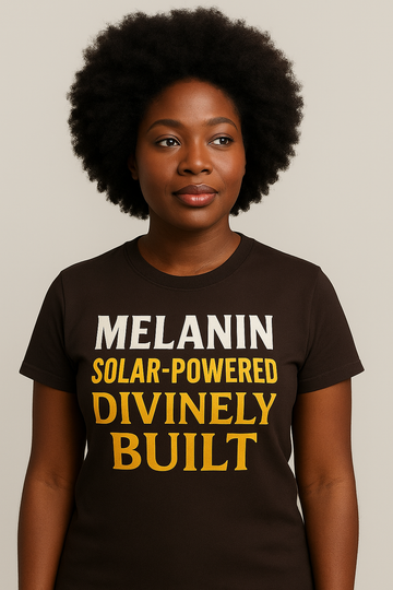 Dark chocolate unisex t-shirt with golden screen-printed “Solar-Powered Divinely Built” text by Soul Seed Apparel, 100% combed ring-spun cotton, tear-away label, shoulder-to-shoulder taping, sizes S–3XL.