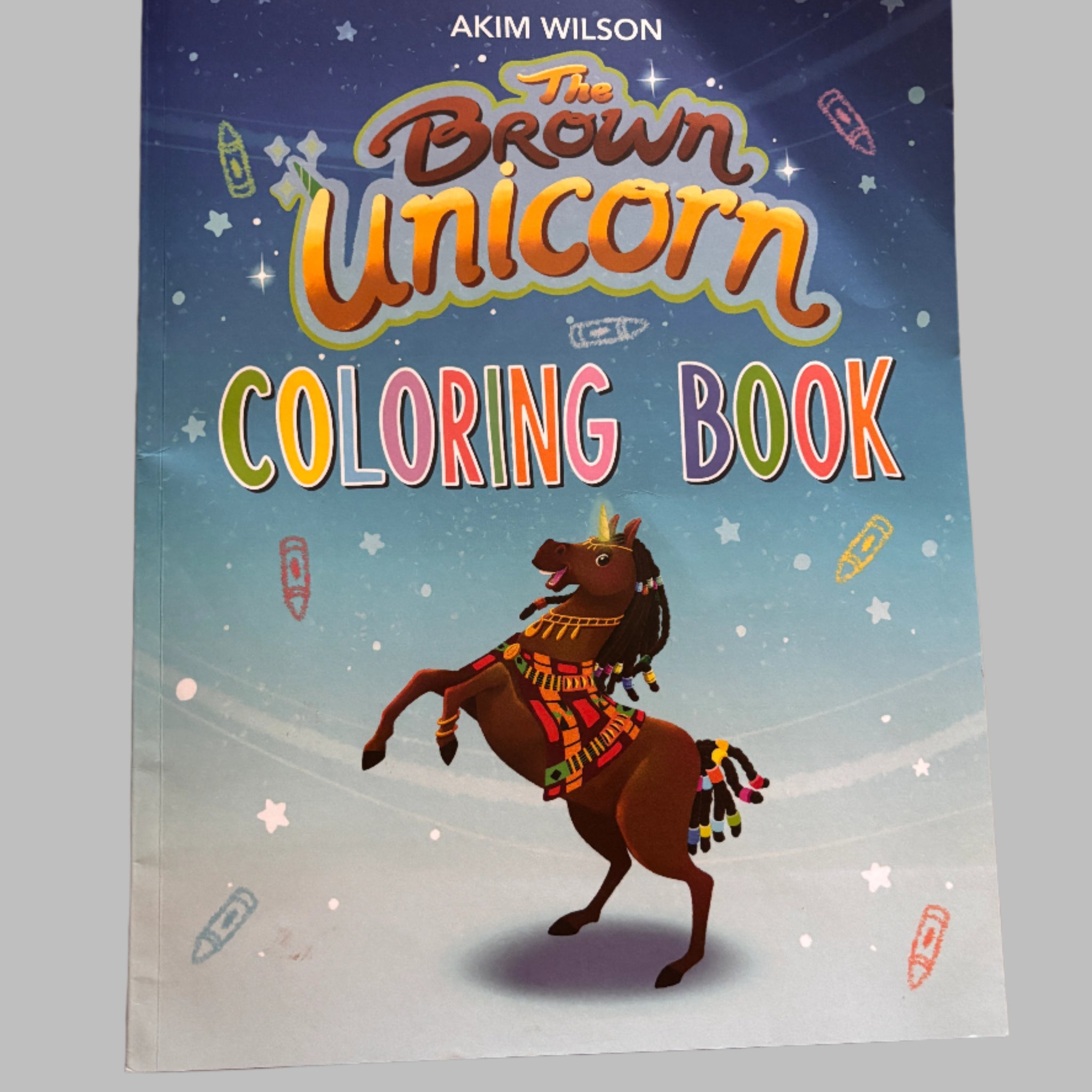 Coloring book titled 'Brown Unicorn' by Akim Wilson 